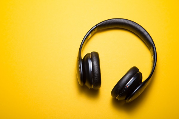 headphones yellow podcast listen music