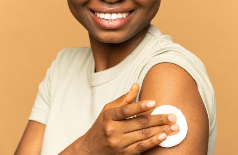 Vaccinated Woman Holding Arm