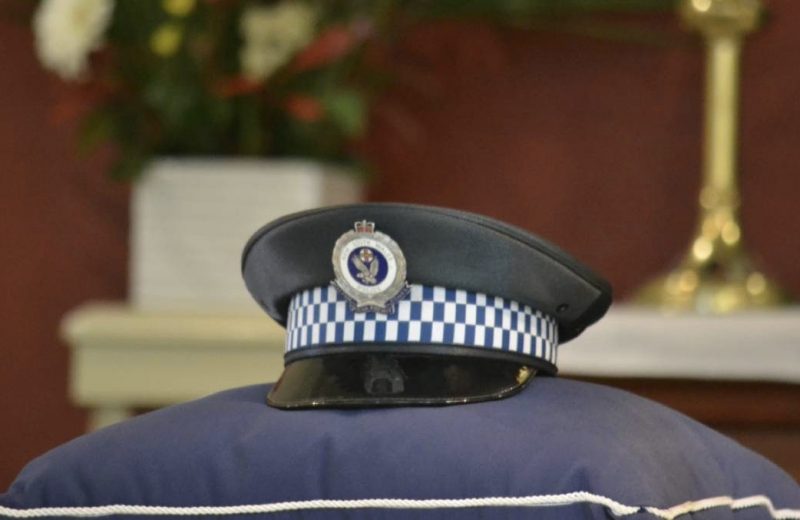 Police Hat on Top of Cushion